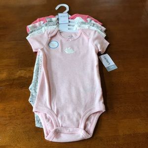Brand new with tags 12 month onesies.